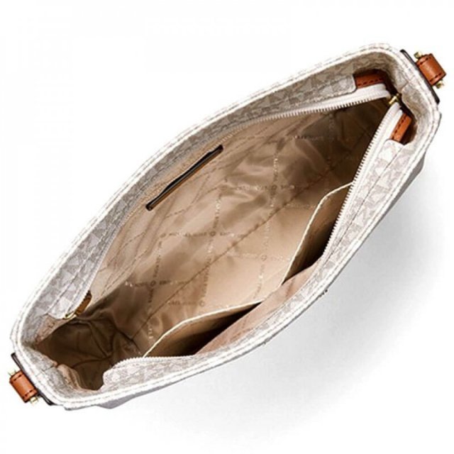 شنطة مايكل كورس ترافيل بيضاء 5 شنطة مايكل كورس ترافيل بيضاء